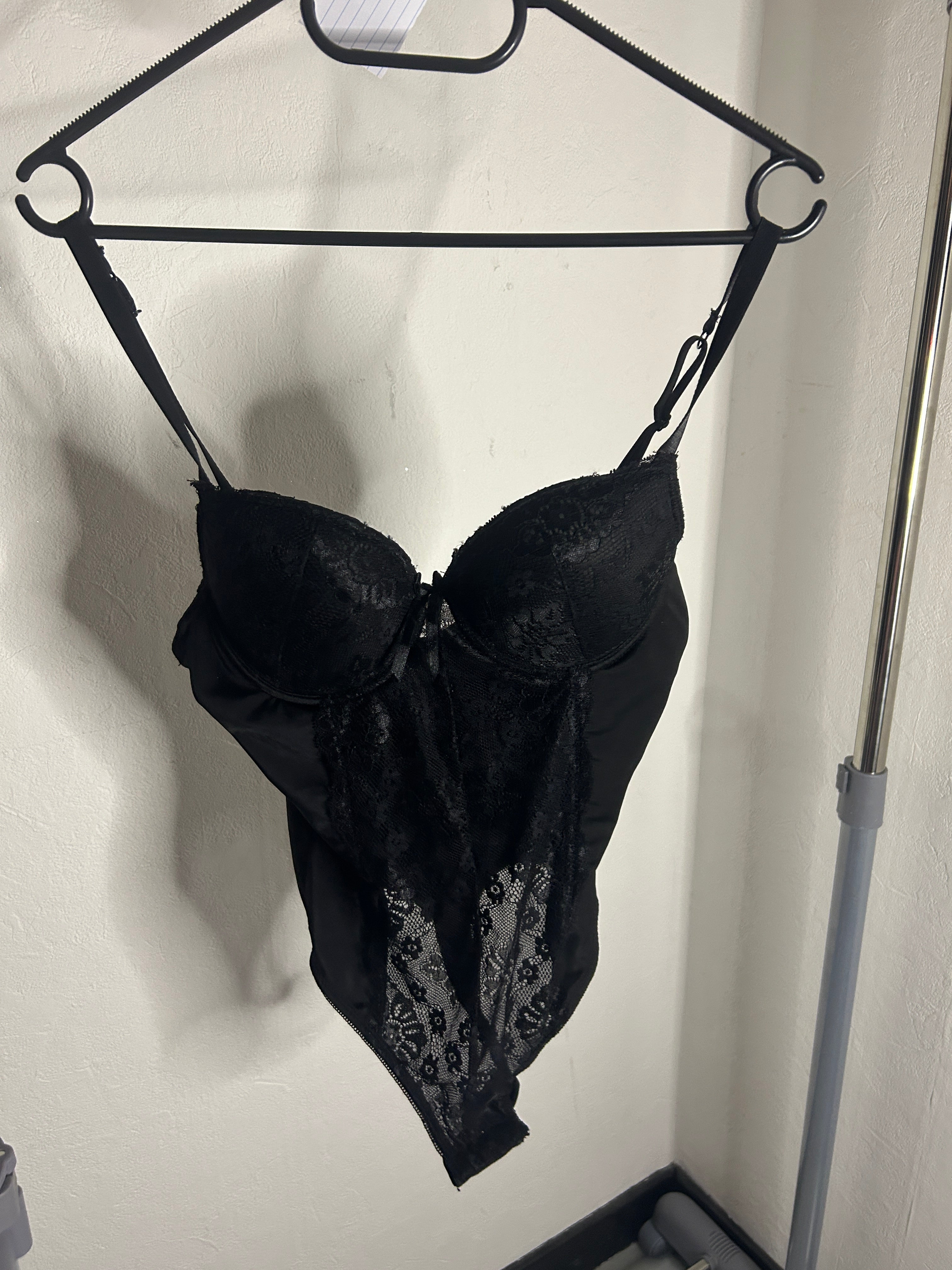Elegant and feminine black bodysuit