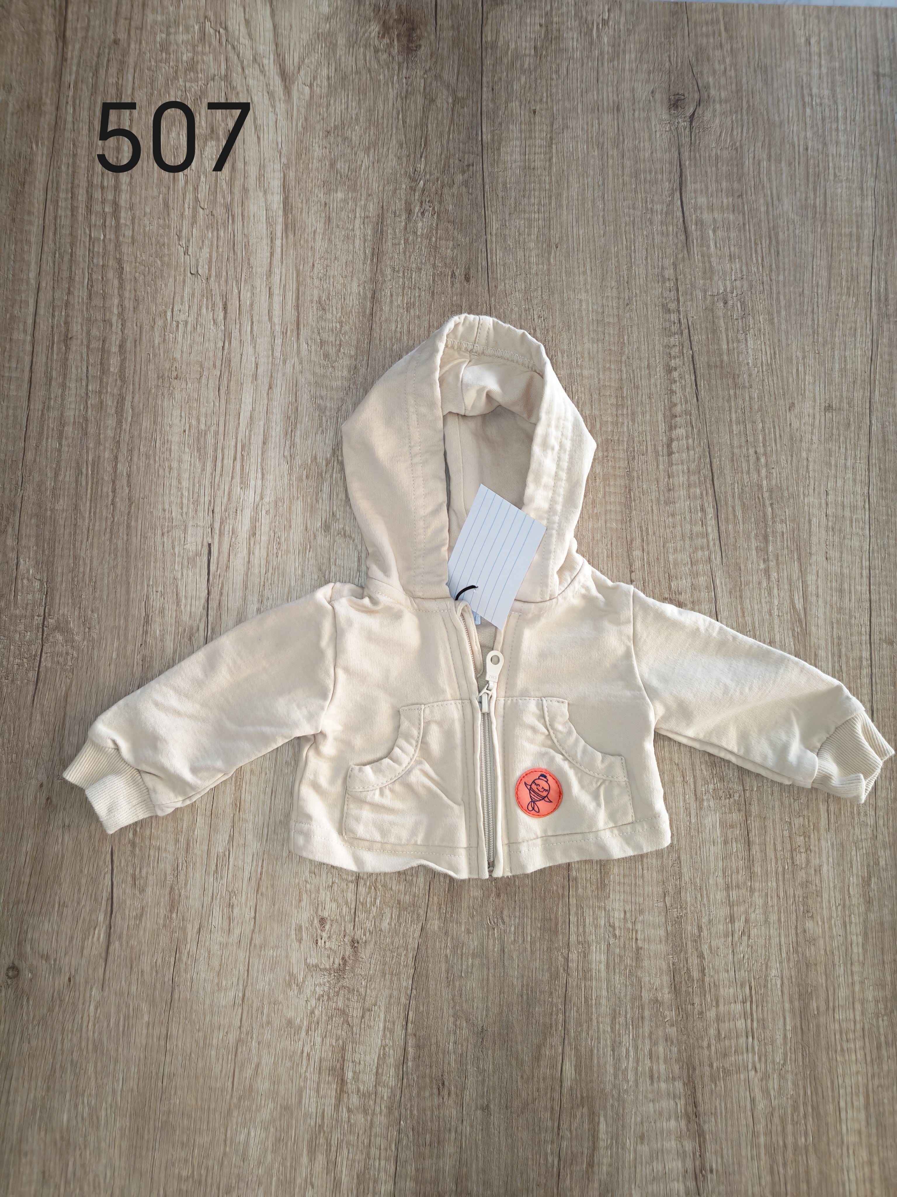 Petit gilet a capuche baby